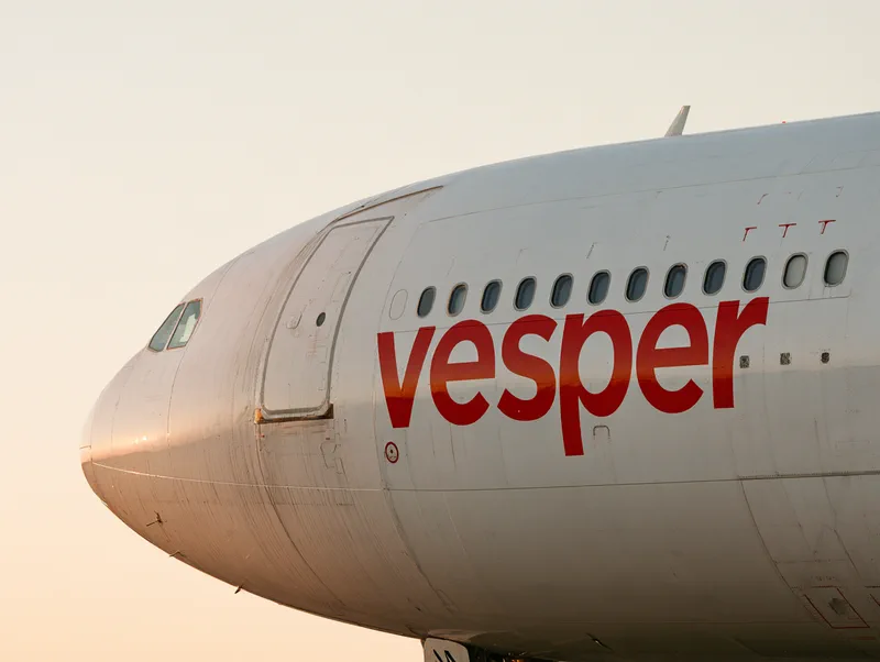 Project Super Jumbo — the name vesper painted large in vermilion on a white fuselage